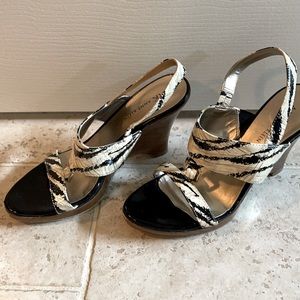 Anne Klein animal print strapped wedge heels.